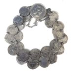 A Dutch white metal coin bracelet, double strand of 5 cent coins on a 25 cent clasp, 23grs