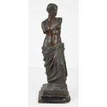 A spelter Venus de Milo figure, bronzed finish on stepped wooden plinth base, 44cm high