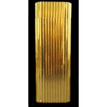 A Cartier gold plated vertical lined lighter marked Cartier Paris 06972K - Swiss made