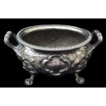 A silver plated oval footed jardinière or tureen, on four paw feet with high loop handles, 33cm