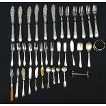 A quantity of silver plated table flatware included fish eaters; cake forks; napkin rings etc