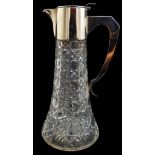 A Walker & Hall silver mounted cut glass claret jug, the glass body of flaring cylindrical form