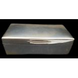 A silver cigarette box, rectangular, London 1943, makers mark worn, 17 x 9 x 5.5cm max