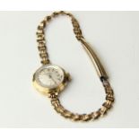 A ladies 9ct gold vintage Trebex wrist watch on rolled gold bracelet