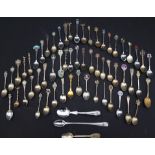 A quantity of silver plated and continental white metal collectors spoons (qty)