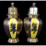 A pair of Mason's Ironstone china Chinese Dragon pattern octagonal baluster vases and covers,