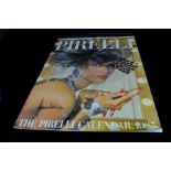 Automobile Motoring Interest - The 1985 Pirelli calender signed and photographed by Norman