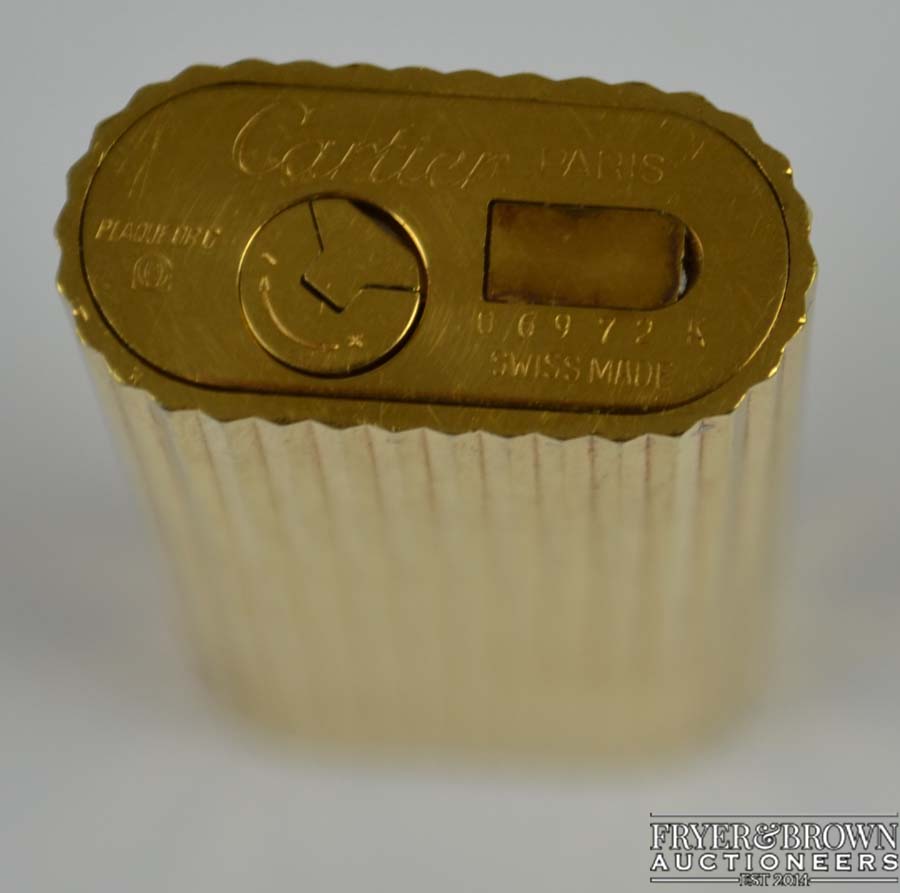 A Cartier gold plated vertical lined lighter marked Cartier Paris 06972K - Swiss made - Image 2 of 2