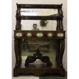 An impressive mid 19thC ormolu and porcelain mounted chiffonier in the french style, the two two