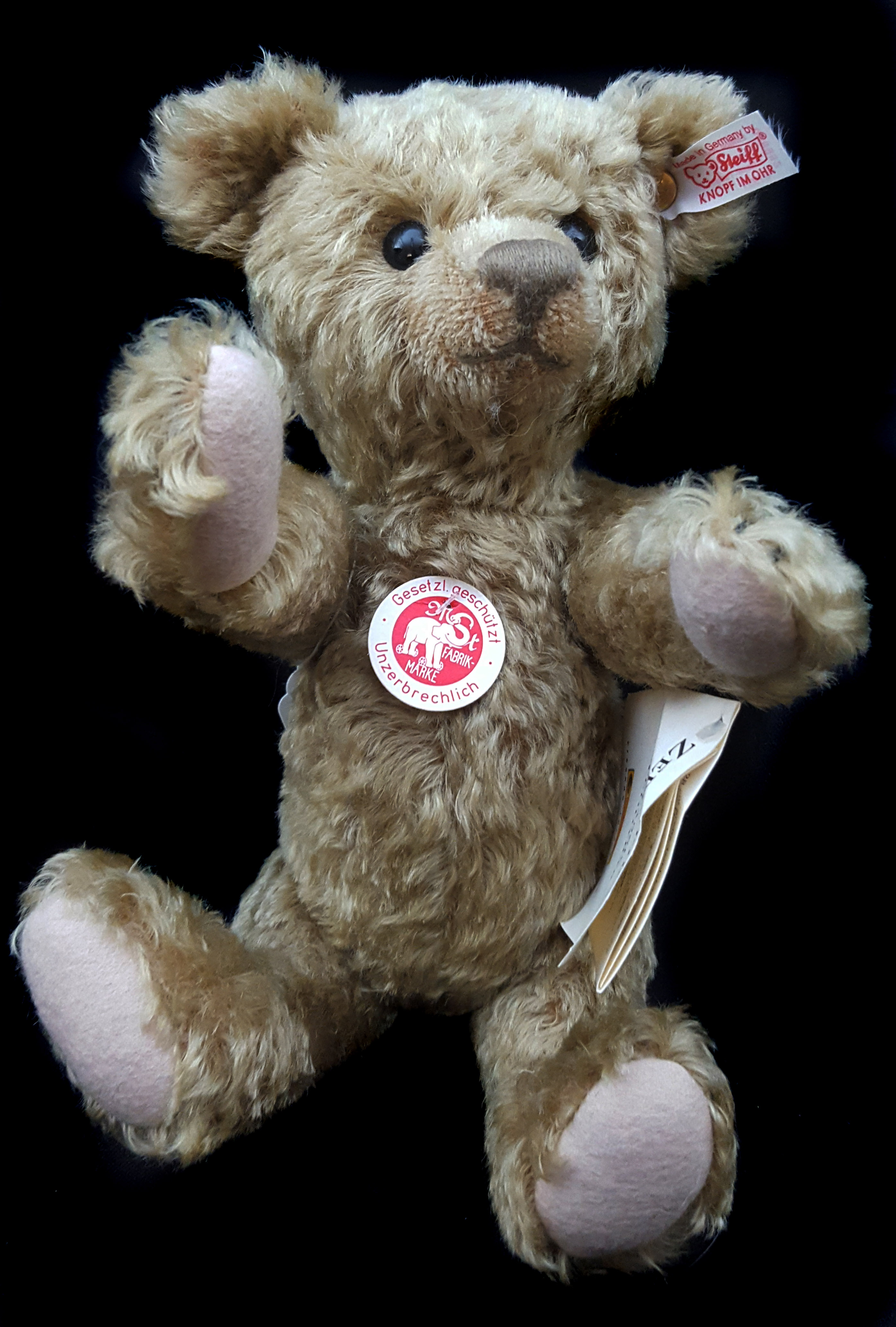 A Margarete Steiff Classic teddy bear, 2004, original paper labels and certificate, numbered 1931,