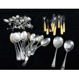 A quantity of silver plated cutlery includes sugar tongs, pickle forks and fish eaters (qty)