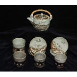 A Japanese or Korean pottery celedon tea wares, comprising tea kettle with bamboo handle, double