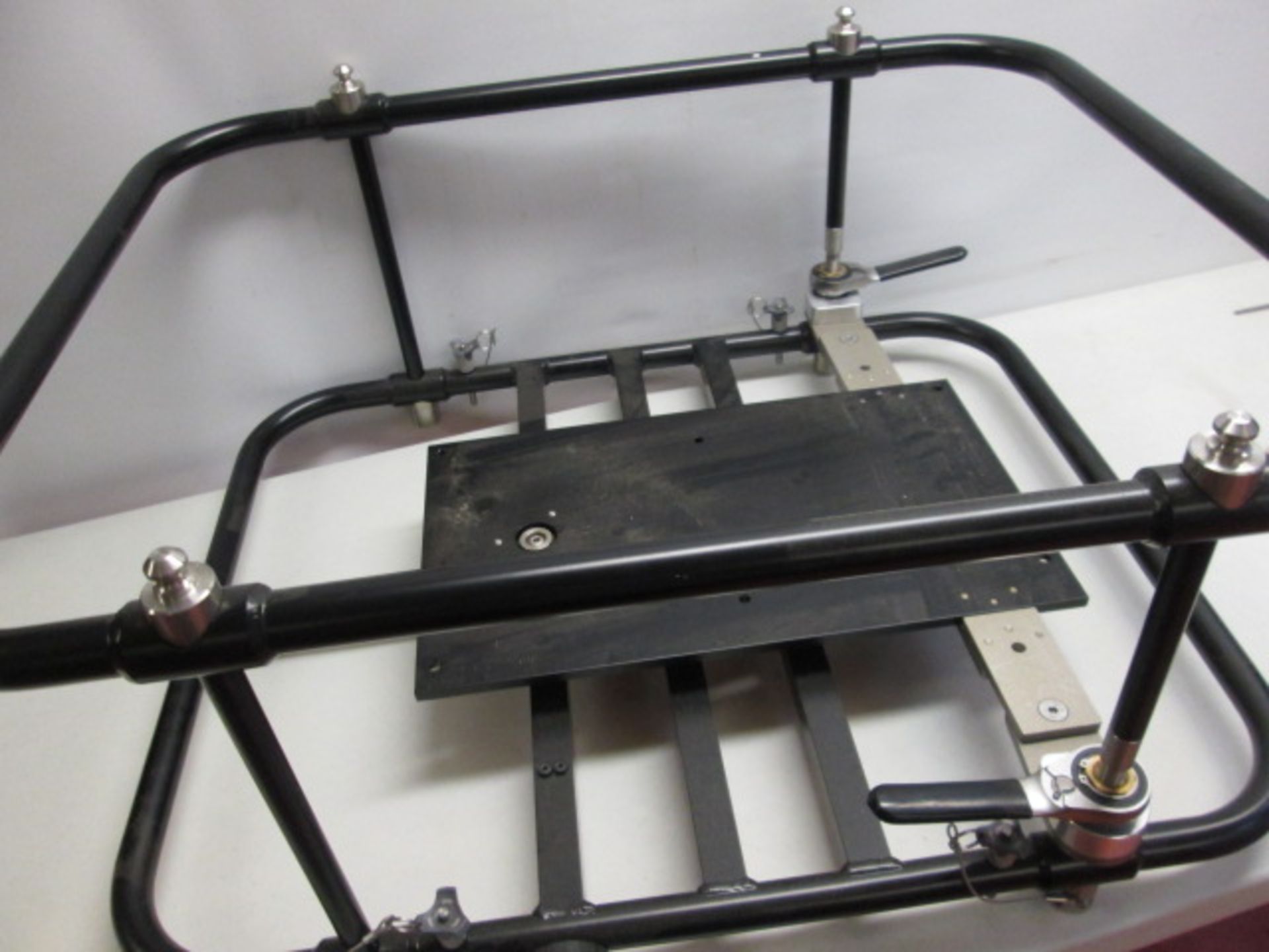 Bespoke Adjustable Projector Cradle. (Believed to be used with the Panasonic PT-DZ870).