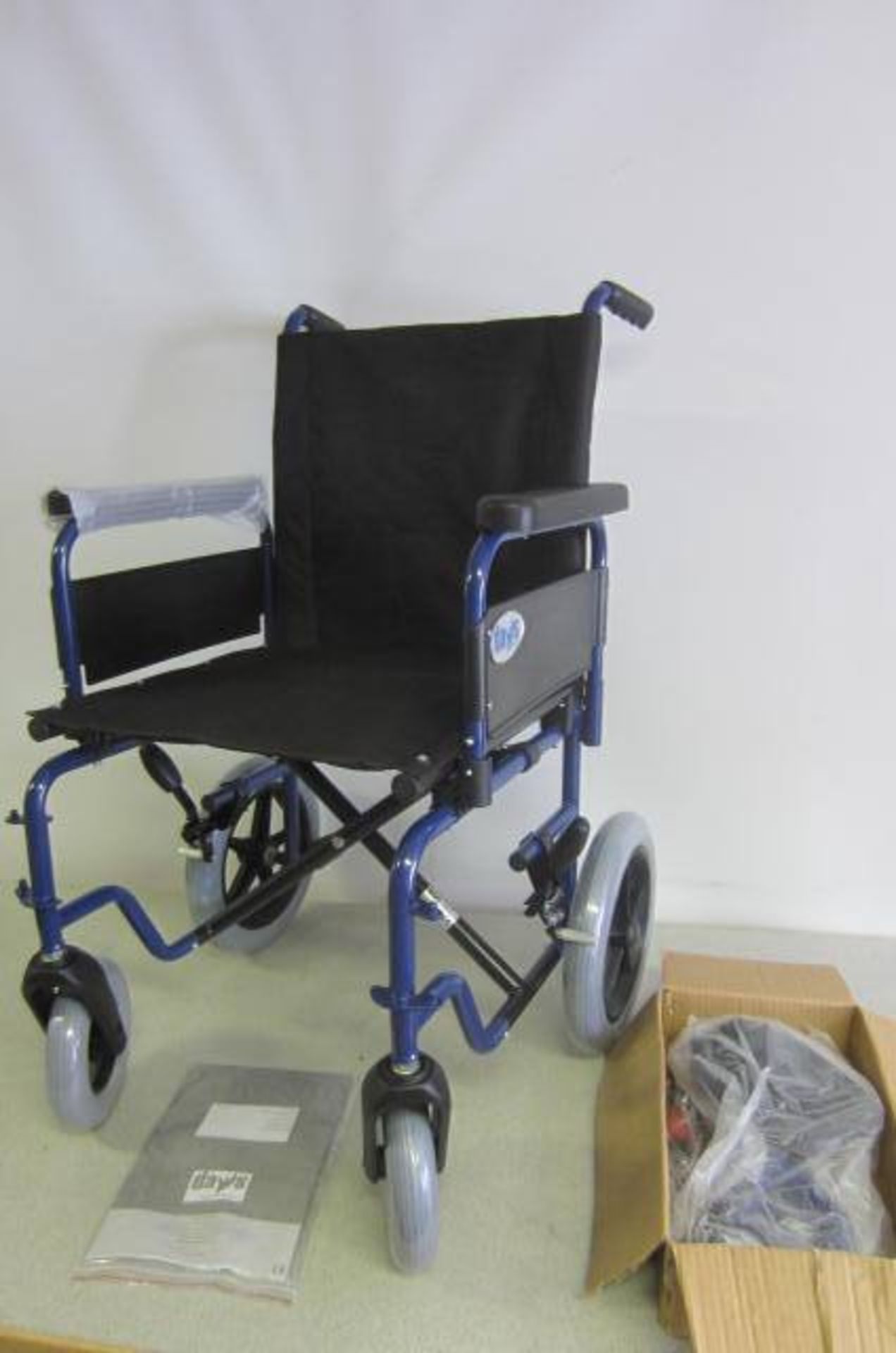 Days Patterson Medical Basic Steel Transit Wheel Chair, Model Equinox 45TR. Boxed as New.