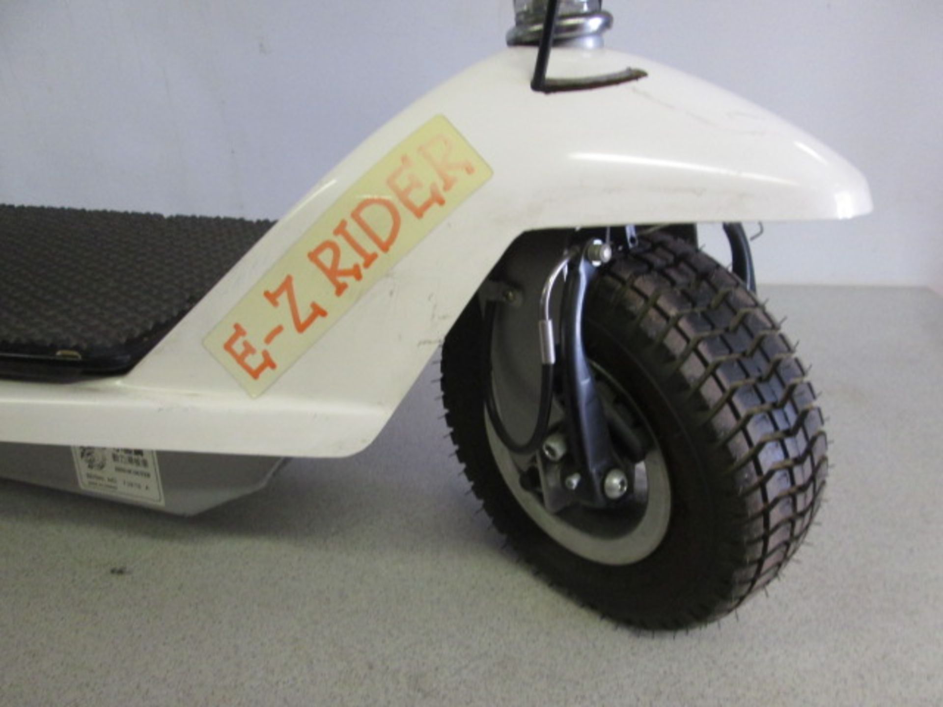 E Z Rider Electric 2 Wheel Mini Scooter. Comes with Battery Charger which Requires Adapter & - Image 2 of 9