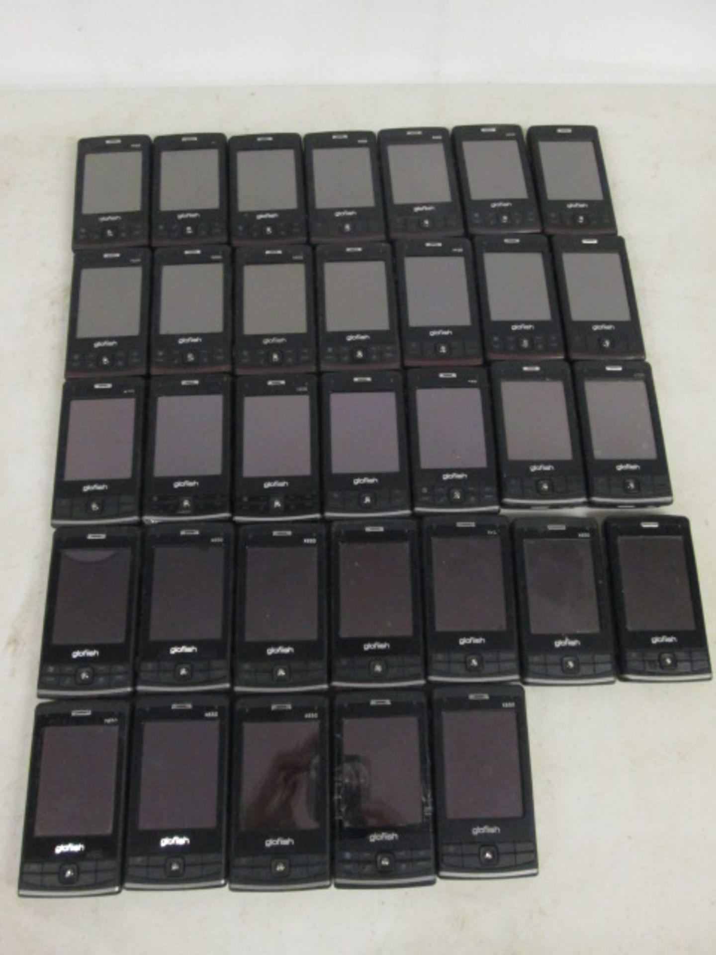 35 x Eten Glofiish X650 & X600 Windows Mobile Smart Phones. No Power Supplies or Chargers, Unable to