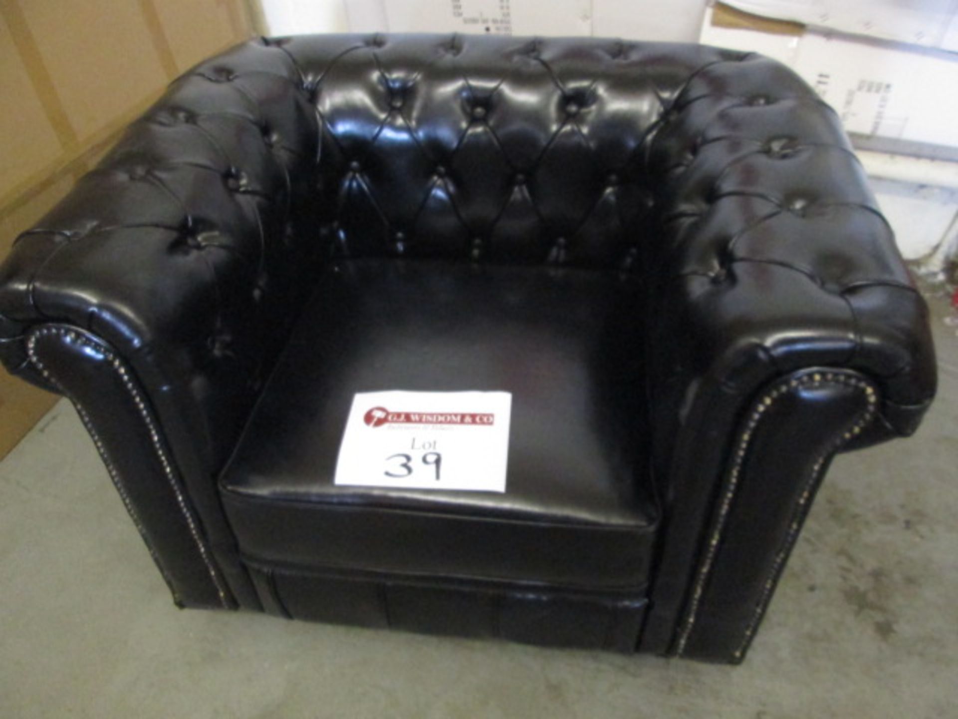 As New/Ex Display - Chesterfield Style Armchair in Black Leather with Wooden Feet.