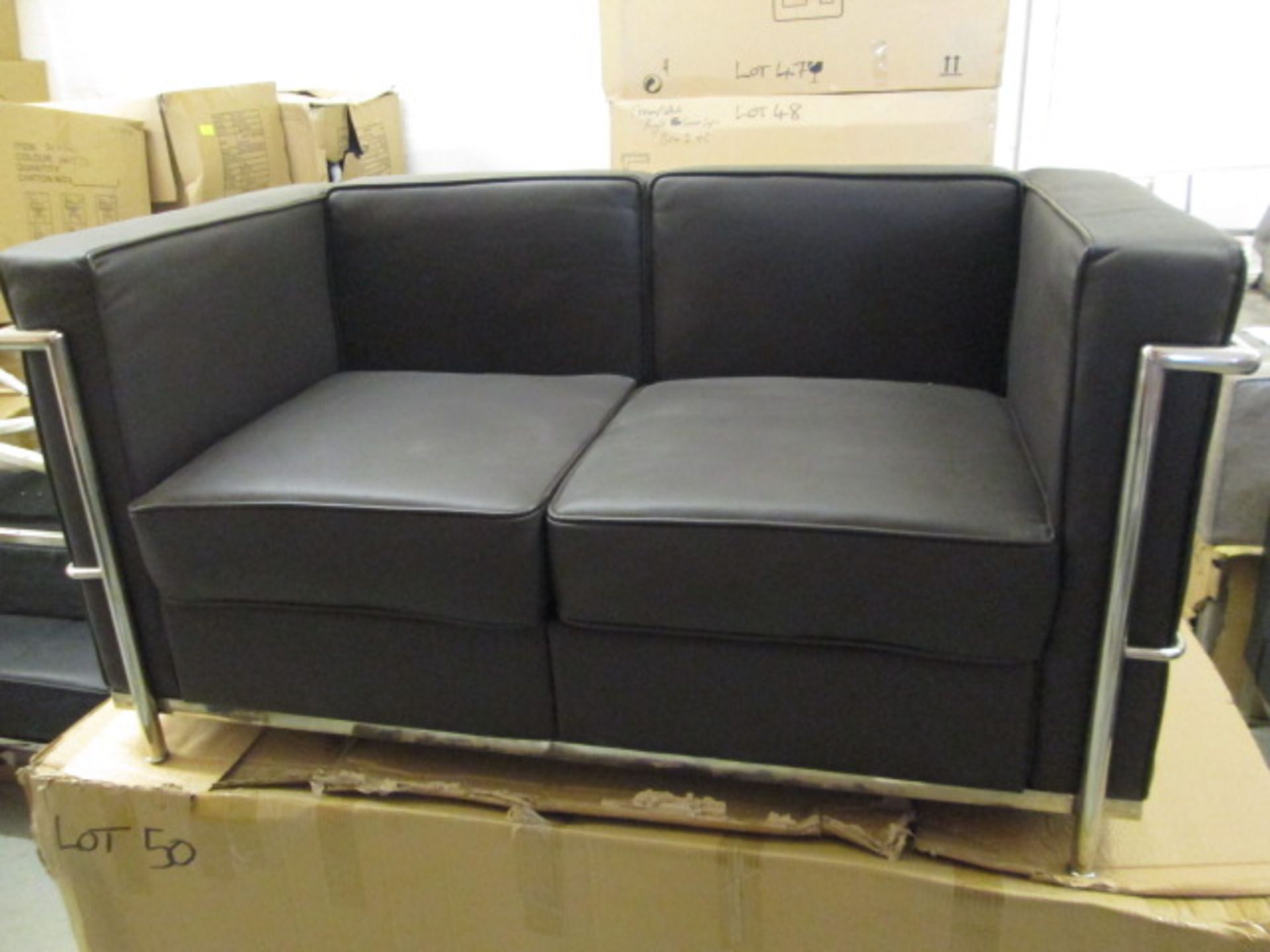 Boxed/As New - Chrome Framed, Brown Leather Sofa (Model TS-S930-2). Size (H) 65cm x (W) 130cm x (