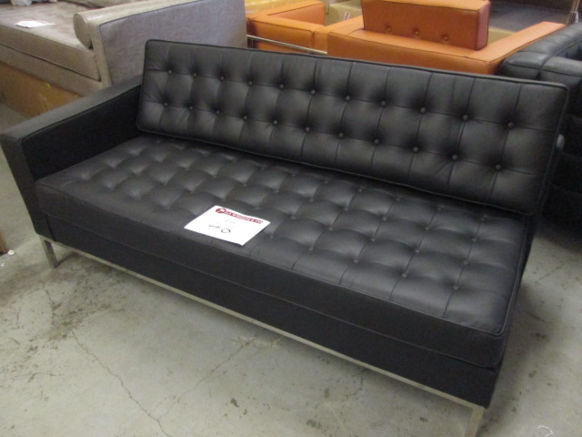 Ex-Display - Single Ended Black Leather Buttoned Sofa on Chrome Base. Size (H) 60cm x (W) 175cm x (