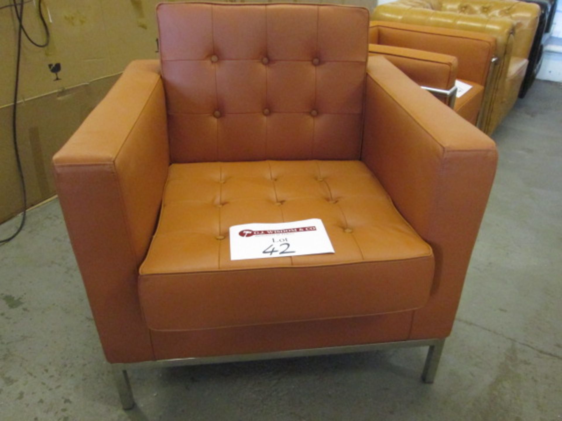 As New/Ex Display - Tan Leather Armchair on Chrome Feet with Reversible Cushions (Model A666).