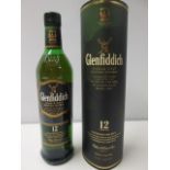 Boxed Bottle of 12 Year Glennfiddich Single Malt Scotch Whisky.