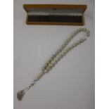 Believed to be Camel Bone Worry Beads in Case. (As Viewed).