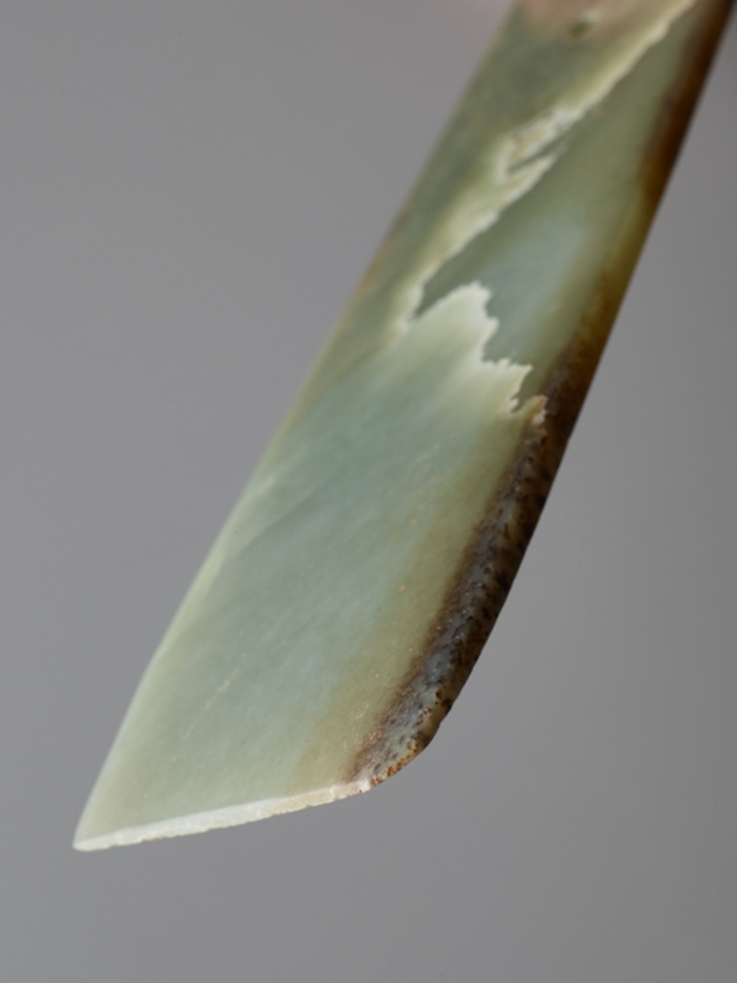 LONG CHISEL-SHAPED BLADEJade. China, Late Neolithic period, Qijia culture, c.2200-1900 BCThis - Image 5 of 6