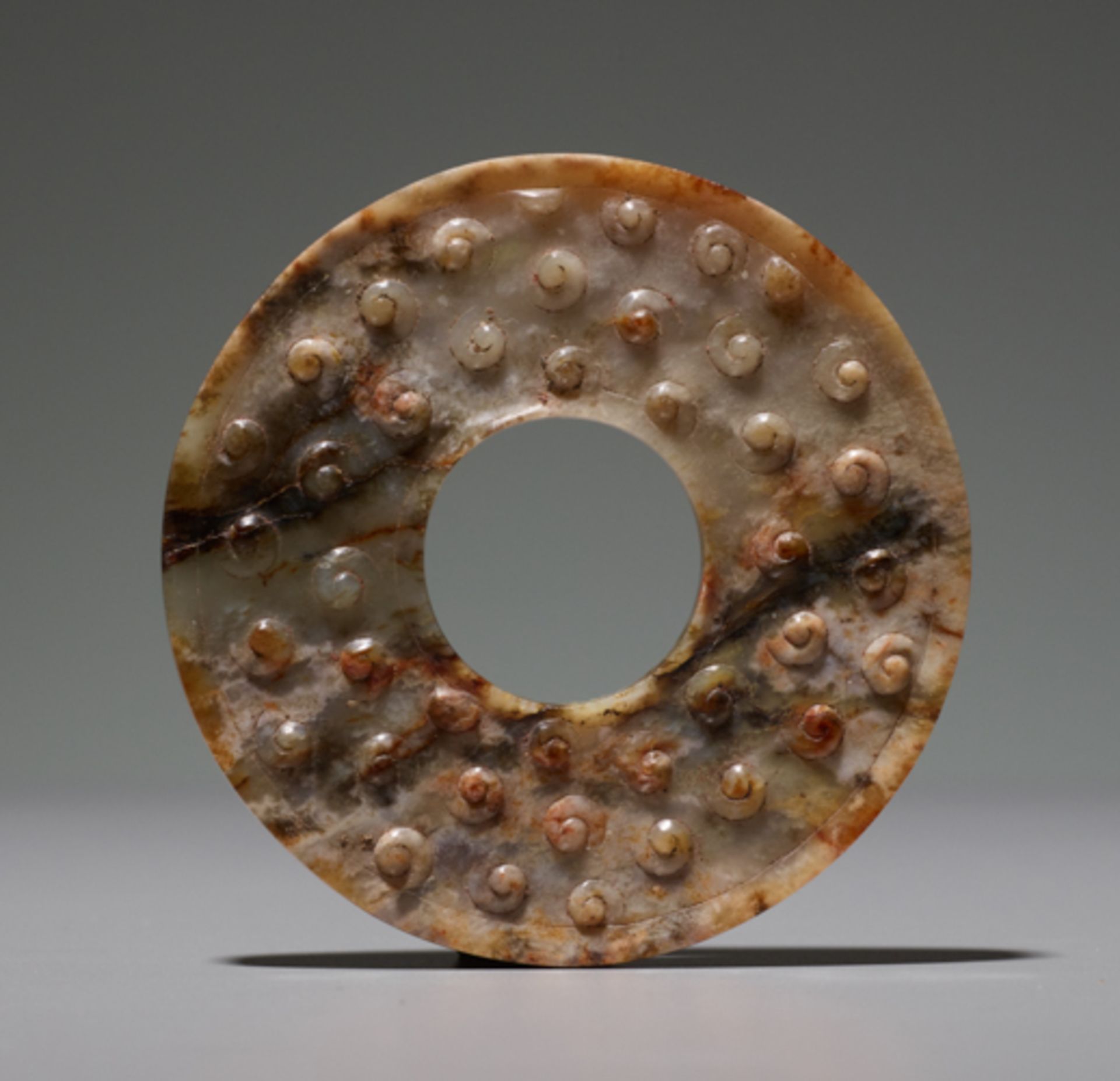 RING WITH INCISED SPIRALSJade. China, Eastern Zhou, 4th–3rd century BCSmall rings like this one were