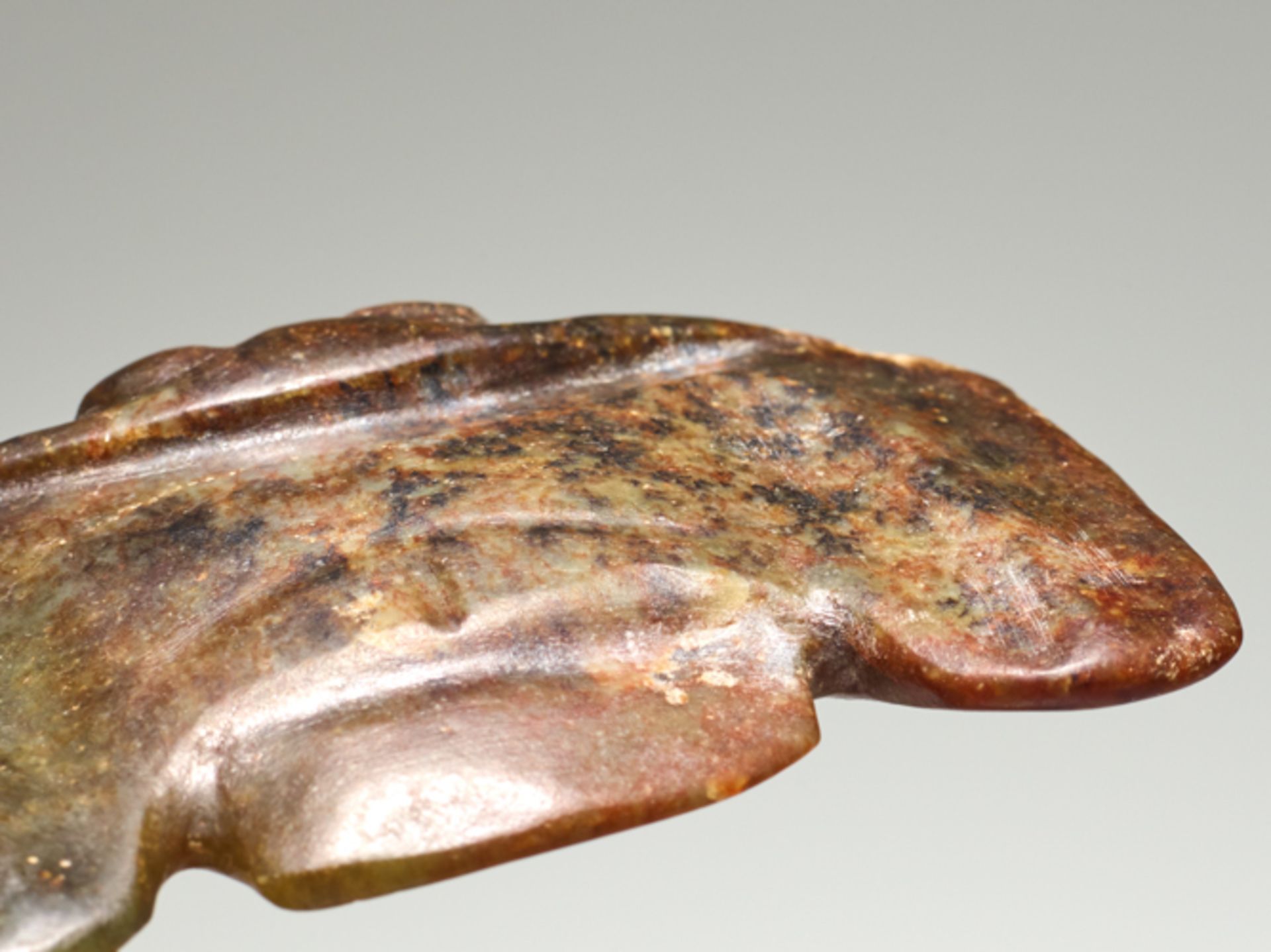 BIRD-SHAPED PENDANTJade. China, Hongshan culture, c.3500-3000 BCPendants shaped as birds form one of - Image 3 of 4