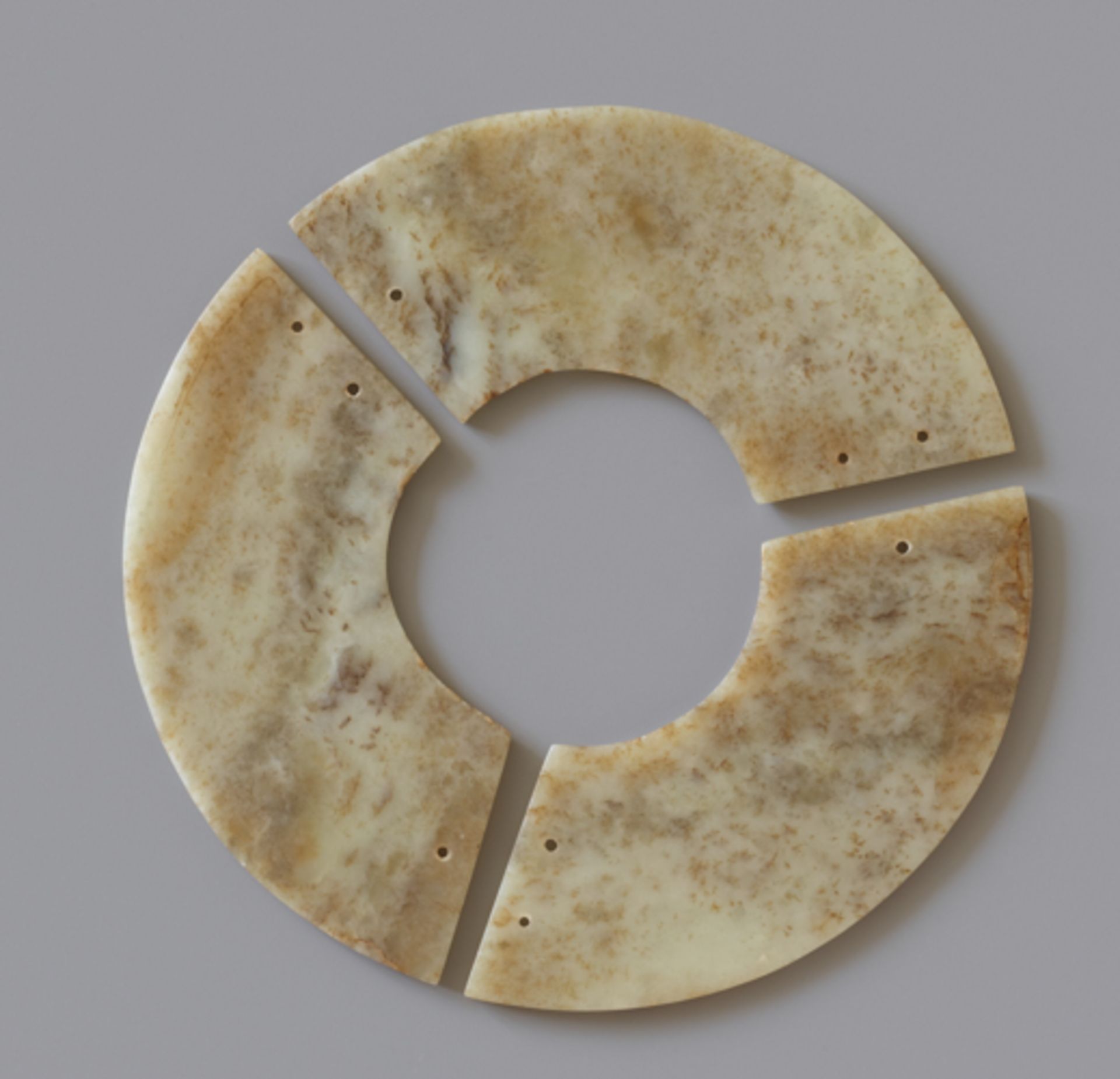 THREE-SECTION DISCJade. China, Late Neolithic period, Qijia culture, c.2200-1900 BCInstead of - Image 2 of 6