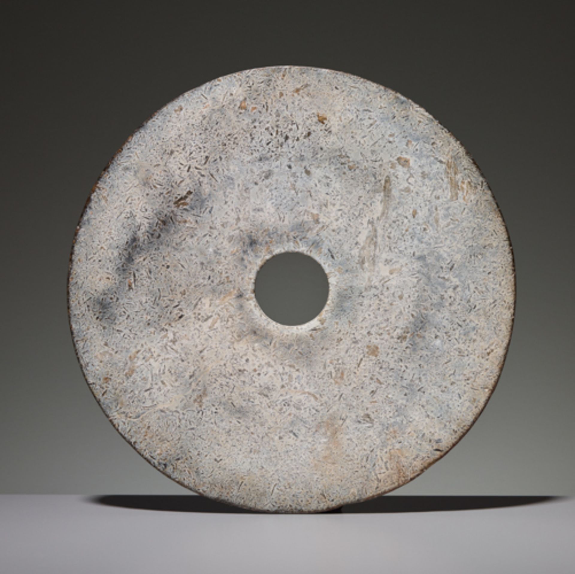 BI DISC Jade. China, Late Neolithic period, early Bronze age, c. 2000 BC This large bi disc has such - Image 2 of 4