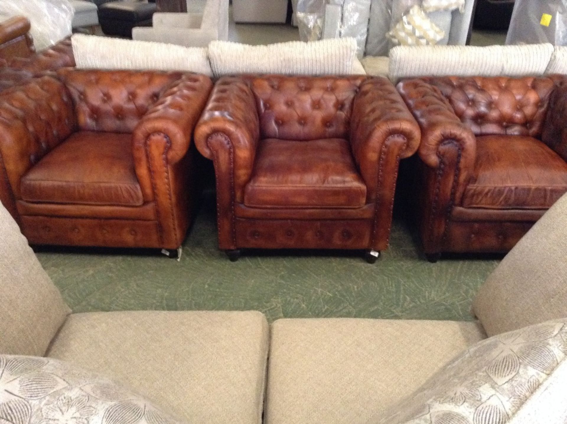 BROWN LEATHER CHESTERFIELD STYLE CHAIR