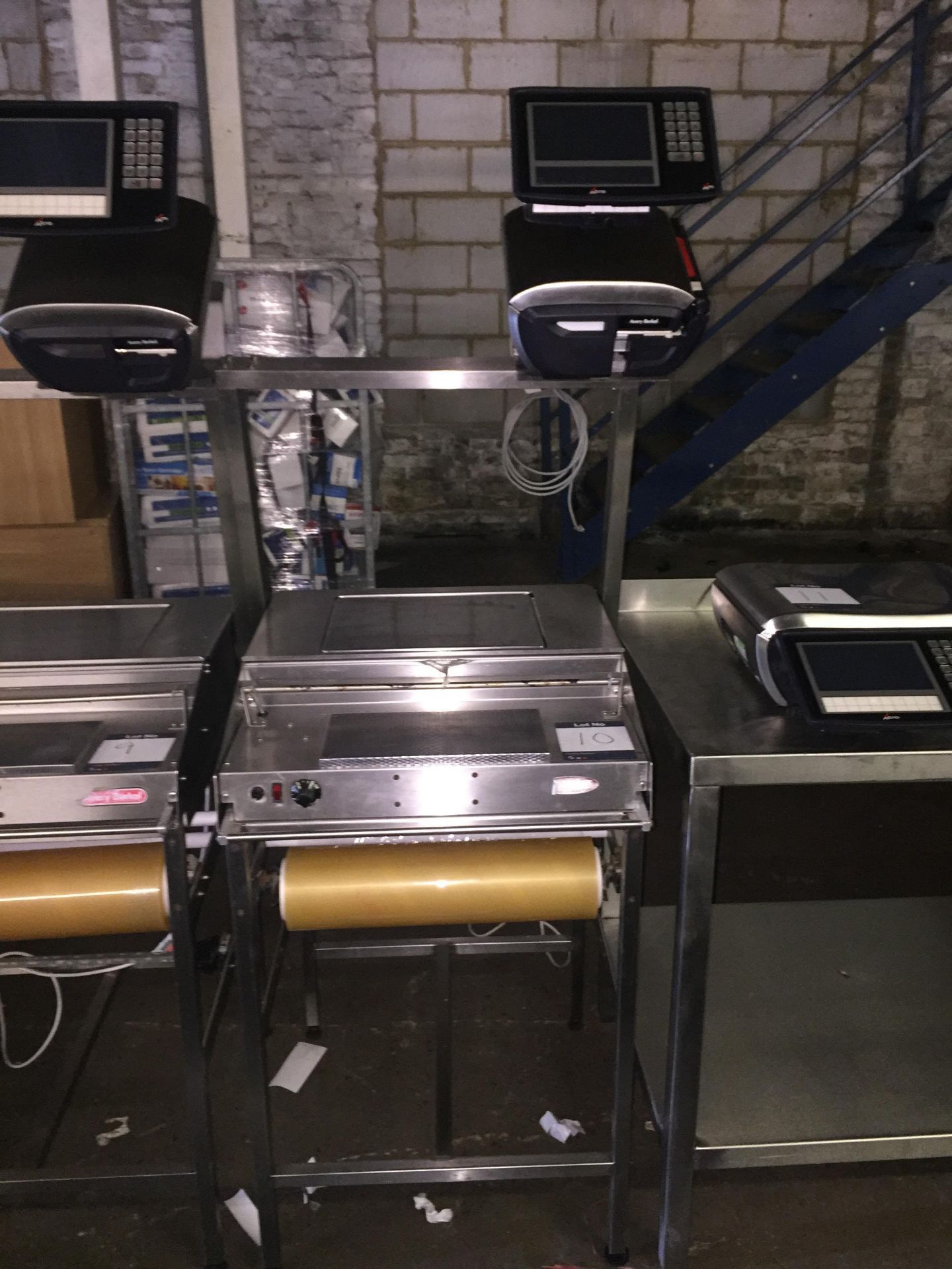 Avery Berkel stainless steel heat sealer with model XM600 printer checkout