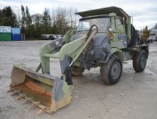 Mercedes Benz/Freightliner Unimog 419 back hoe loader Year: 1991 Serial Number: HM452009 Recorded