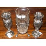A pair of Art Nouveau silver plated vases and another with glass liner