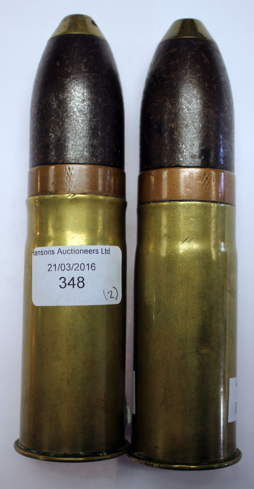 Pair WW1 German 37mm artillery shells. Marked "Patronfabrik Karlsruhr" 119A and dated 1915.