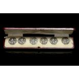 A cased set of Edwardian, Art Nouveau style silver buttons, reticulated cast bluebell design,