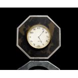 An Art Deco silver mounted tortoiseshell bedside timepiece,