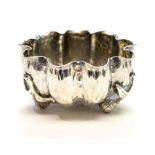 An Aesthetic Movement silver salt cellar, of naturalistic form,