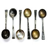 A set of six Art Deco silver coffee spoons, plain circular bowls on flattened stems,