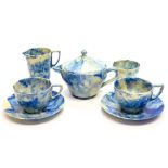 A Beatl electric blue and green marble resin tea for two set,