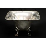 An Art Deco silver bowl, flared conical form with everted rim, supported on square section,