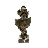 An Art Nouveau style bronzed bust of a woman, signed indistinclty in the cast, on marble base,