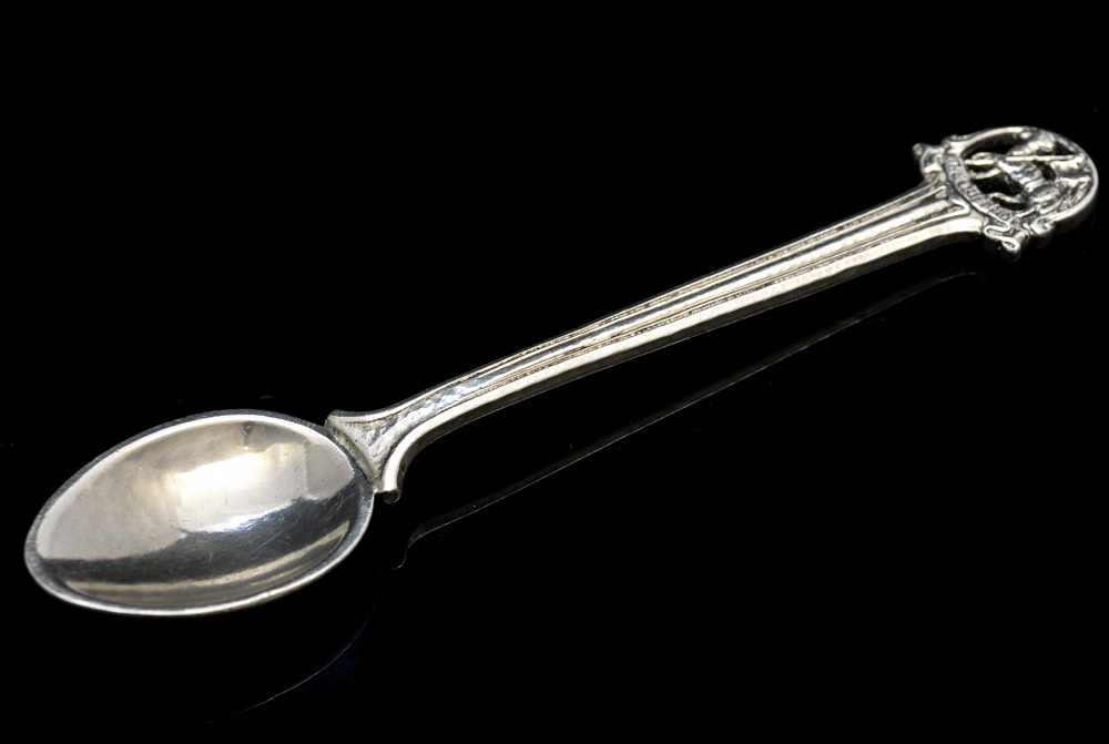 Omar Ramsden, an Arts and Crafts silver hand hammered coffee spoon,