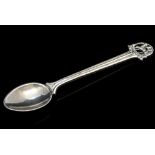 Omar Ramsden, an Arts and Crafts silver hand hammered coffee spoon,
