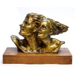 Rene Varnier, Deux Adolescents, a bronze figure of two heads, on wooden base, signed,