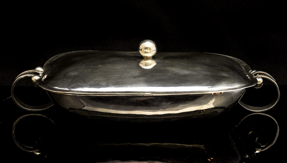 William Spratling, a Taxco Mexican silver entree dish and cover, circa 1940-44, hand hammered,