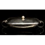 William Spratling, a Taxco Mexican silver entree dish and cover, circa 1940-44, hand hammered,