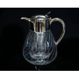 A 1950s glass water jug, the bulbous body with acid etched wrythen stripe design,