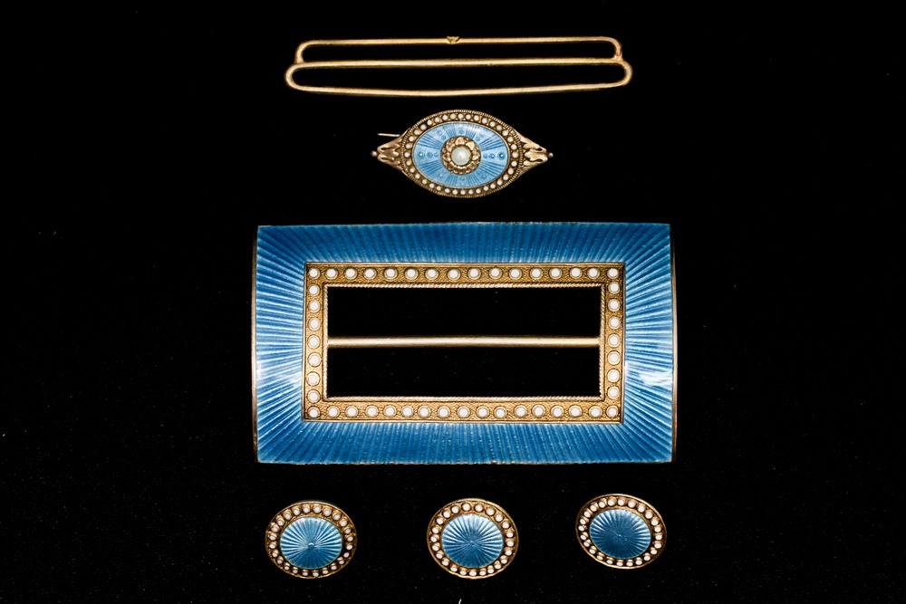 Marius Hammer, a Norwegian silver gilt and enamelled buckle and button set,